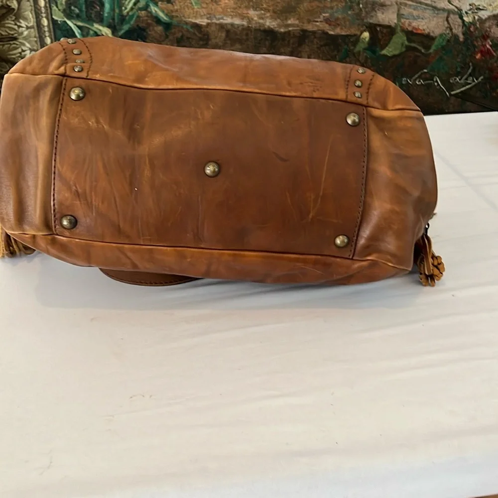 Capacciou large brown Leather bag  side zip pockets 2  long leather tassels
